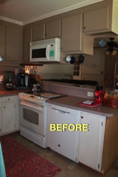  The old kitchen, complete with difficult access to the corner storage space (next to the oven)....Bob can fix that! 